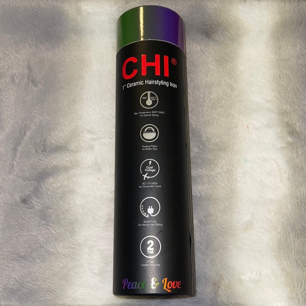 - Limited edition Chi 1" Ceramic Hairstyling Iron Peace And Love Edition